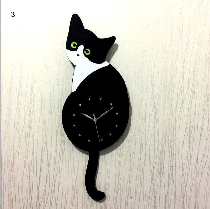 Horloge murale en forme de chat avec queue mobile