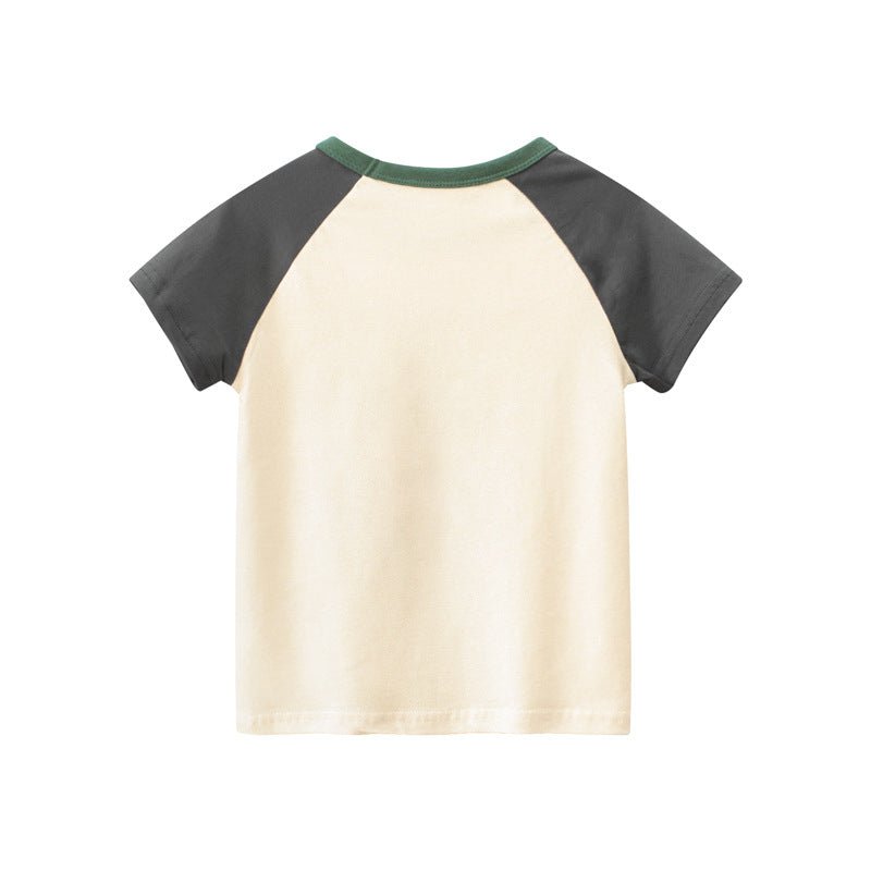 T-shirt pour enfant avec des manches courtes arborant un motif de crocodile.